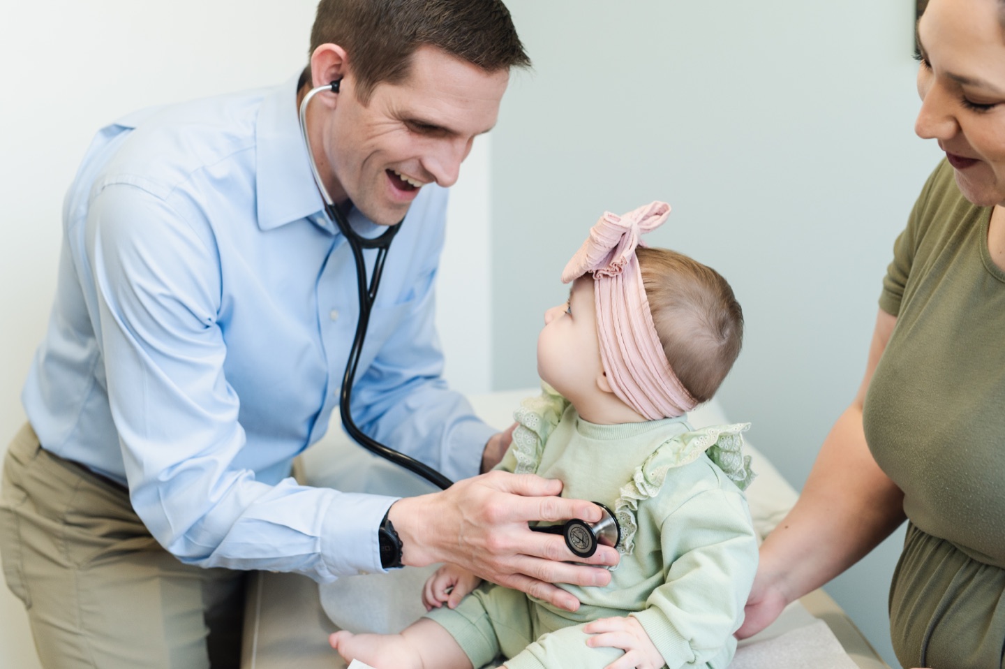 Dr. David Merrell caring for a young patient at Carolina Medical Group